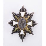 A German Hamburg Cross: the eight pointed star with central oval depicting a German soldier in