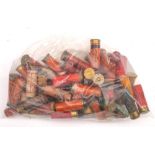 A collection of 50 assorted paper case shotgun cartridges: * Notes This lot will not be released