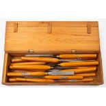 A set of eighteen Sorby wood turning chisels in a pine box: (appear to be unused,