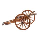 A scale model of a field gun: the 15 inch steel barrel on an oak carriage with polished steel