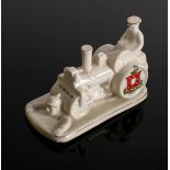 A rare WWI period crested ware model of a Tommy driving a steamroller over the Kaiser by Arcadian