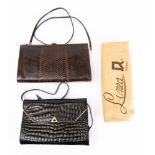 A Black Crocodile skin handbag by Bidente: with gold tone fixtures,