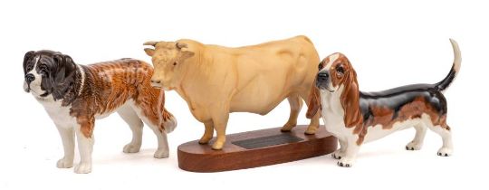 Three Beswick figures: comprising Charolais Bull, under matt, on wooden plinth,