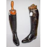 A pair of Tom Hill black leather riding boots with trees: and one other pair of black leather