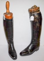 A pair of Tom Hill black leather riding boots with trees: and one other pair of black leather
