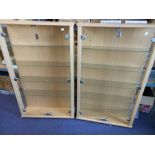 A pair of teak effect and glazed collectors display cabinets: with adjustable glass shelves,