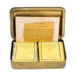 A 1914 Christmas Tin: containing original tobacco, cigarettes and greetings card,