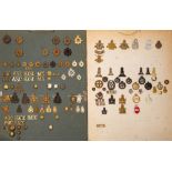 A collection of Corps and ATS cap badges, etc.