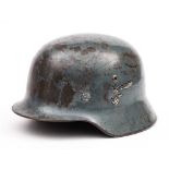 A WWII German M40 pattern Stahlhelm: grey with transfer decal,