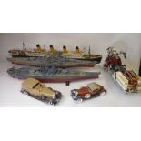 A collection of constructed plastic ship, motorcycle and car models: includes RMS Titanic, Bismark,