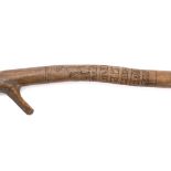A WWII German Afrikra Korps POW walking cane: the natural root shaft hand decorated with eagle and