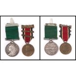 An unnamed Victorian Volunteer Long Service Medal: together with an Edwardian LCC King's Medal (2)
