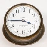An early 20th century Swiss dashboard timepiece with retailers mark for J M Roberts, London,