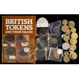 A small group of 18th century tokens and an associated book.