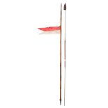 A British Army Regulation 1868 pattern lance: the socket head tip on a bamboo shaft with red and