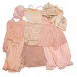 A small collection of mid 20th century ladies silk night wear: including white and pink silk slips,