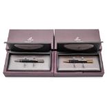 Two parker Duofold ball pens; one with gold plated finish, the other with silver plated finish,