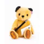 A Steiff 'Sooty' limited edition bear No 386: yellow with black ears,