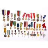 A collection of various miniature world orders and medals: including a Tunisian Order of Nichan