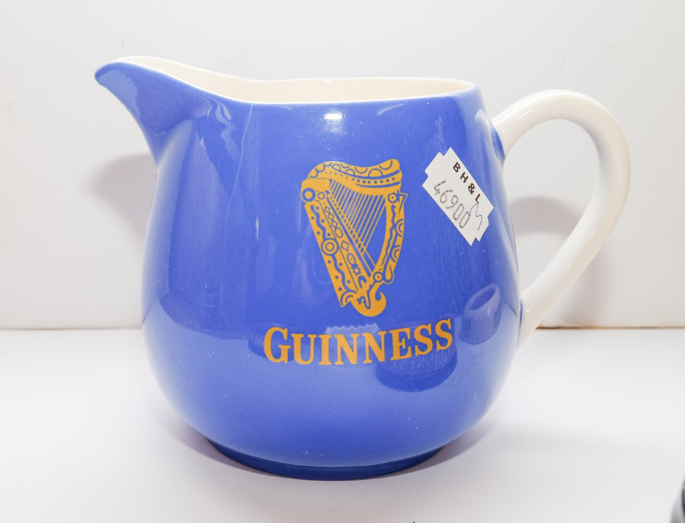 A group of five Guinness advertising ashtrays: together with a blue glaze Guinness water jug and a - Image 3 of 6