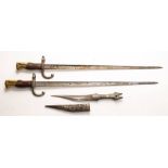Two WWI St Etienne pattern bayonets: together with an Indian white metal mounted dagger (3)