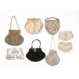 A group of mid 20th century evening purses: comprising four beadwork purses, a mesh evening purse,