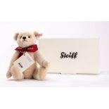 A Steiff 'Margaretes 1909-2009' white plush Teddy bear: stud and tag to ear with boot button eyes,