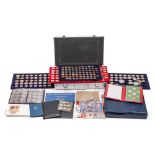 Collectors cases containing approx thirty four 50p coins: two £5 coins,