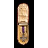 An unnamed George V Military Cross in case of issue: newspaper cutting pinned to interior of case