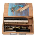 A small group of six fountain pens: including a Croxley green marbled pen,