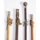 A group of four swagger sticks: Royal Welsh Fusiliers, Royal Artillery,