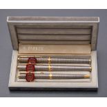 A Parker sterling silver pen set in Cisele finish, fountain pen with 18k gold nib,