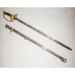 A reproduction US Union Officer's sword: the straight single edged blade with militaria decoration
