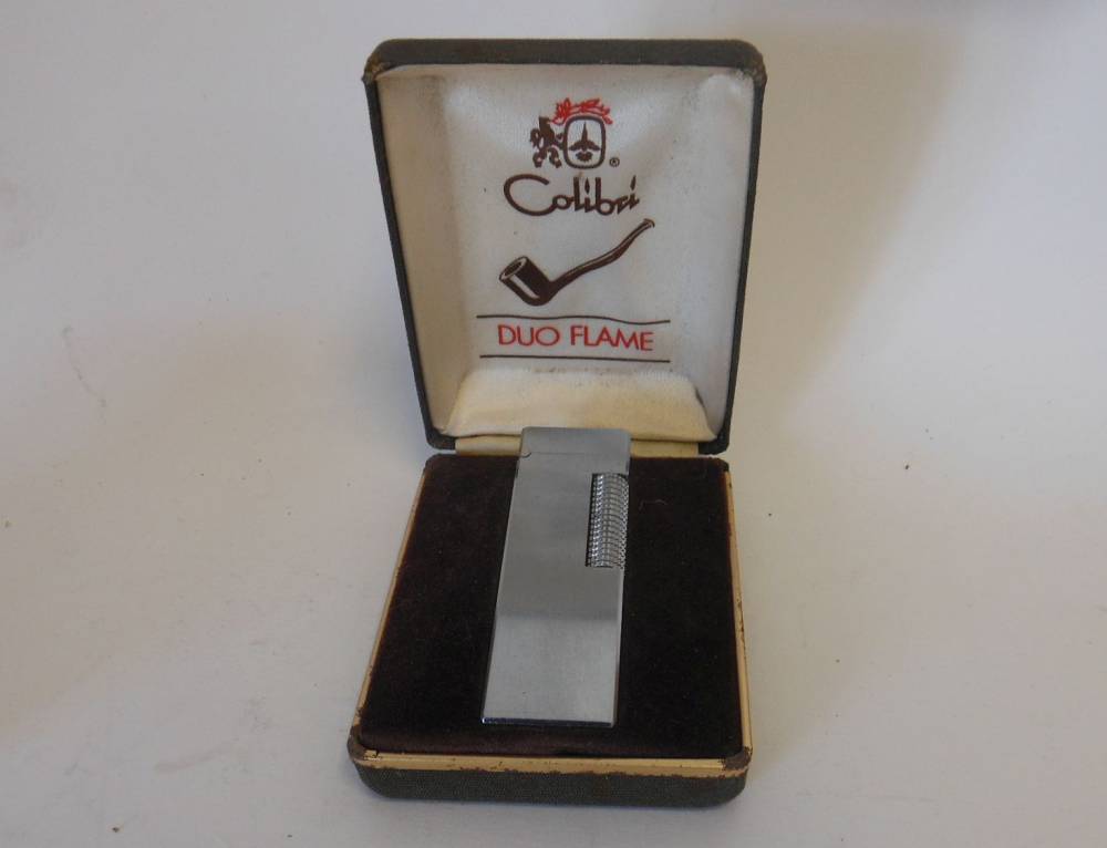 A Calibri Duo flame lighter: contained in a fitted case with instructions.