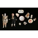 Two late 19th Century German Bisque doll house dolls and small group of porcelain cups and