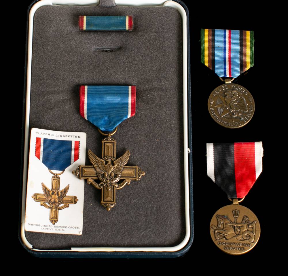 A USA Distinguished Service Cross in case of issue: together with a USMC Occupation Service Medal