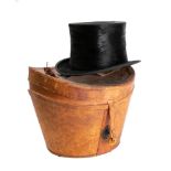 A black felt top hat in leather case: 56cm diameter( leather case worn).