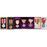 A group of seven Japanese medals and orders: including an Order of the Rising Sun, 8th class,