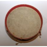 A WWI period scratch built toy drum: constructed from a tin, bentwood,