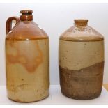 Two large stoneware bottles: one stamped 'C W Blundell & Co.
