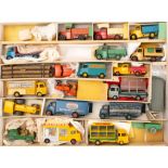 An unboxed group of predominantly French Dinky commercial vehicles: including No.