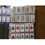 Wills, Players and others, assorted sets of cigarette cards:- sets include Ships Badges,