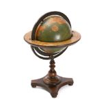 An 8 inch Terrestrial Globe by Kittinger Company Incorporated USA: with lithograph printed paper