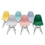 A set of six North American coloured plastic and metal 'Shell' chairs, by Herman Miller,