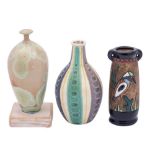 Three art pottery vases: comprising an Amphora Campina two handled vase enamelled with a Kingfisher,