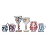 Aldermaston Pottery two goblets, three jugs and a mug: each with brushwork decoration,