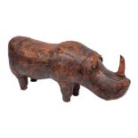 A brown leather covered stool in the form of a rhinoceros, in the manner of Liberty & Co.