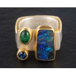 Tanja Ufer, a silver, boulder opal, sapphire and cabochon-cut emerald ring,