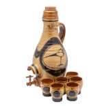 *A Paul Whalley earthenware cider set: comprising a tapering cistern with handle and tap painted