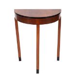 A walnut and ebonised demi-lune side table in Art Deco taste, circa 1930,